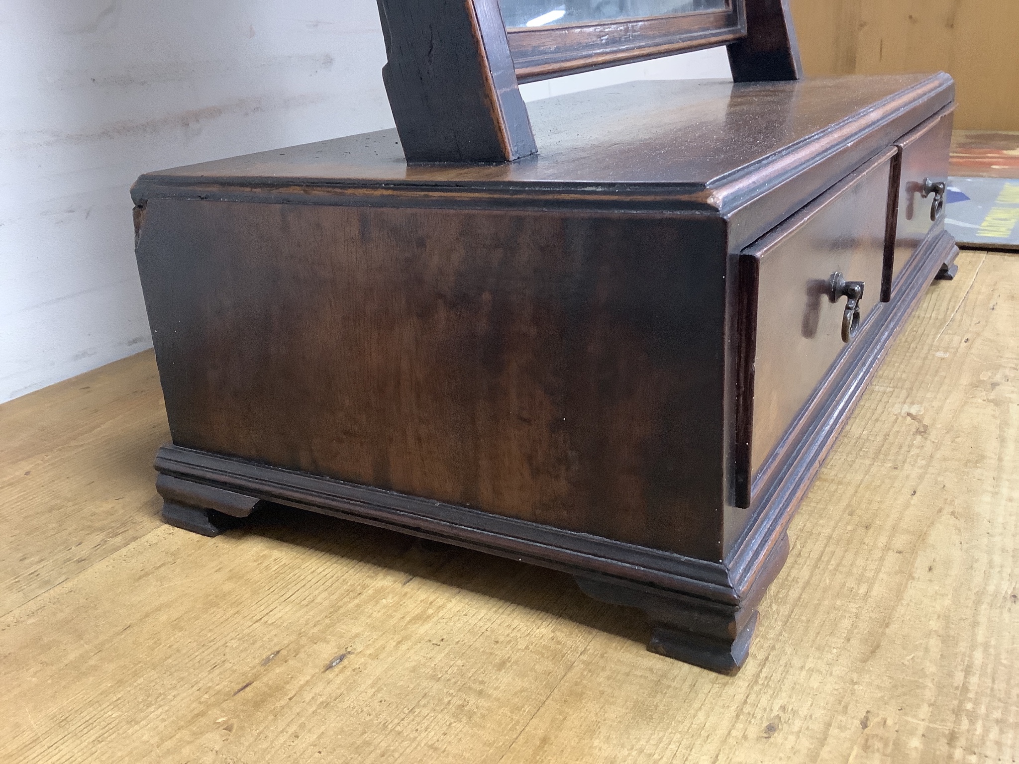 A George III mahogany two drawer box base toilet mirror, width 46cm, depth 23cm, height 62cm